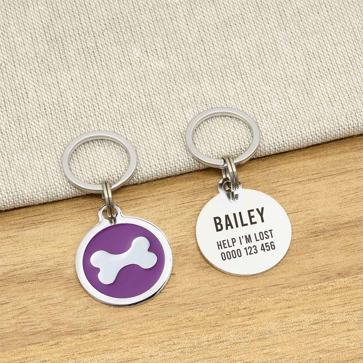 Engraved Zinc Alloy Dog Name ID Tag -  Purple Bone - About Pets