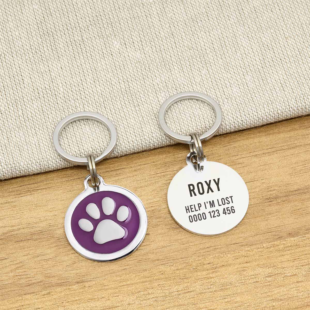 Engraved Zinc Alloy Dog Name ID Tag -  Purple Colour Paw - About Pets